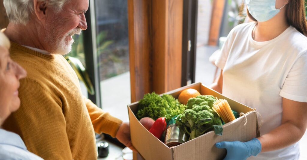 nonprofit in Colorado delivering vegetables in a box to those in need