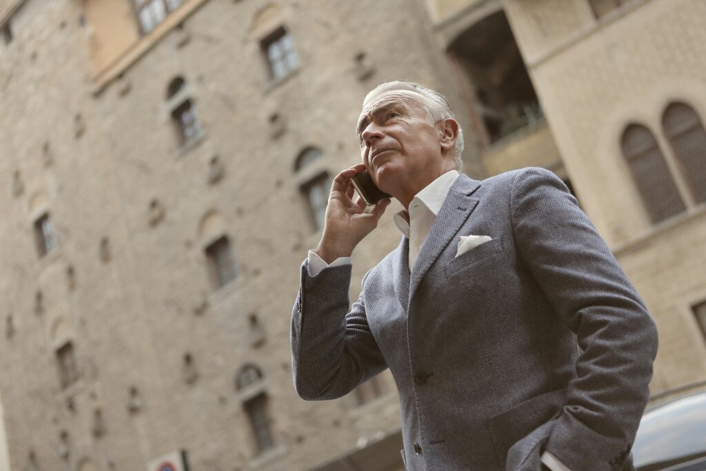 man calling prospect on a real estate deal